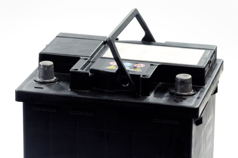 Close up photo of 12 volts battery in a white background.