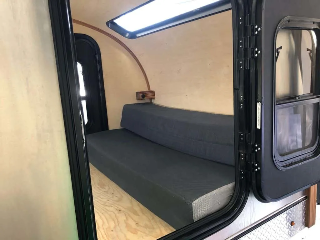 Sofa trifold mattress inside teardrop trailer