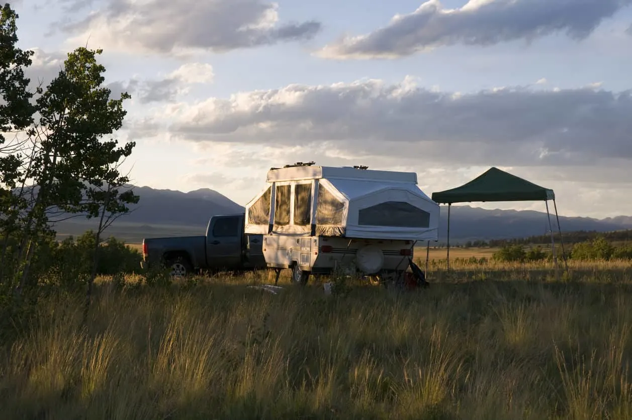 Pop-up tent trailer at sunrise