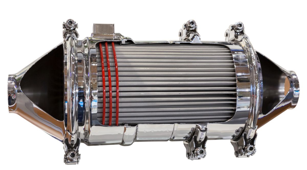 A clear view of Catalytic converter in a white isolated background.