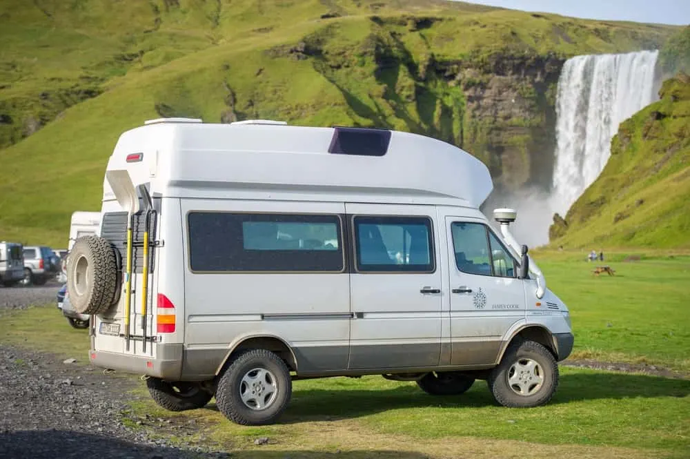 Conversion van parked up near Skogafoss waterfalls in Iceland.