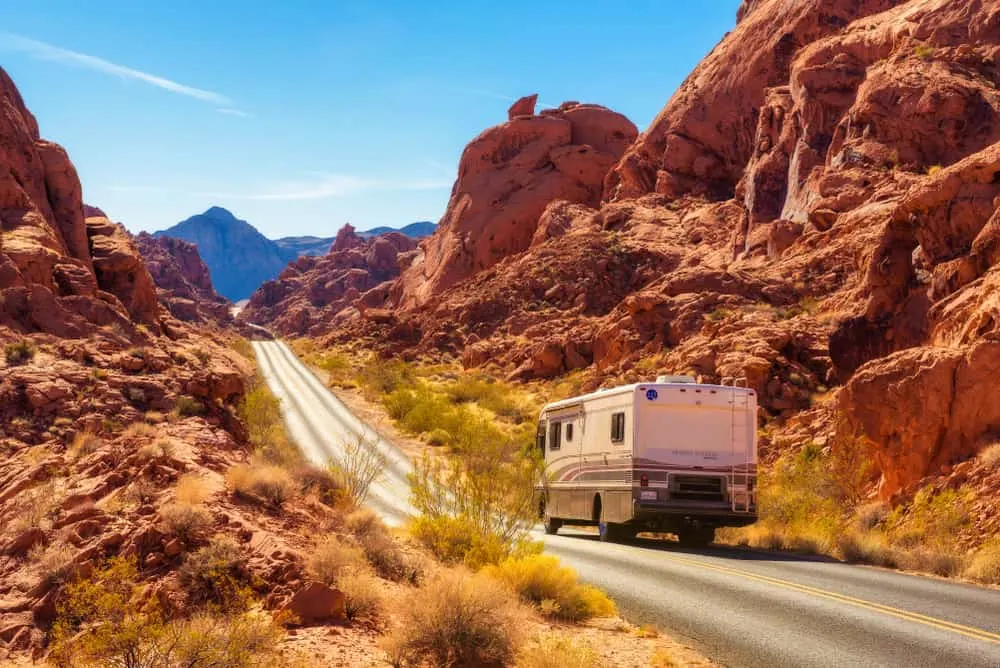 This is an RV traveling through the Valley of Fire in Nevada.