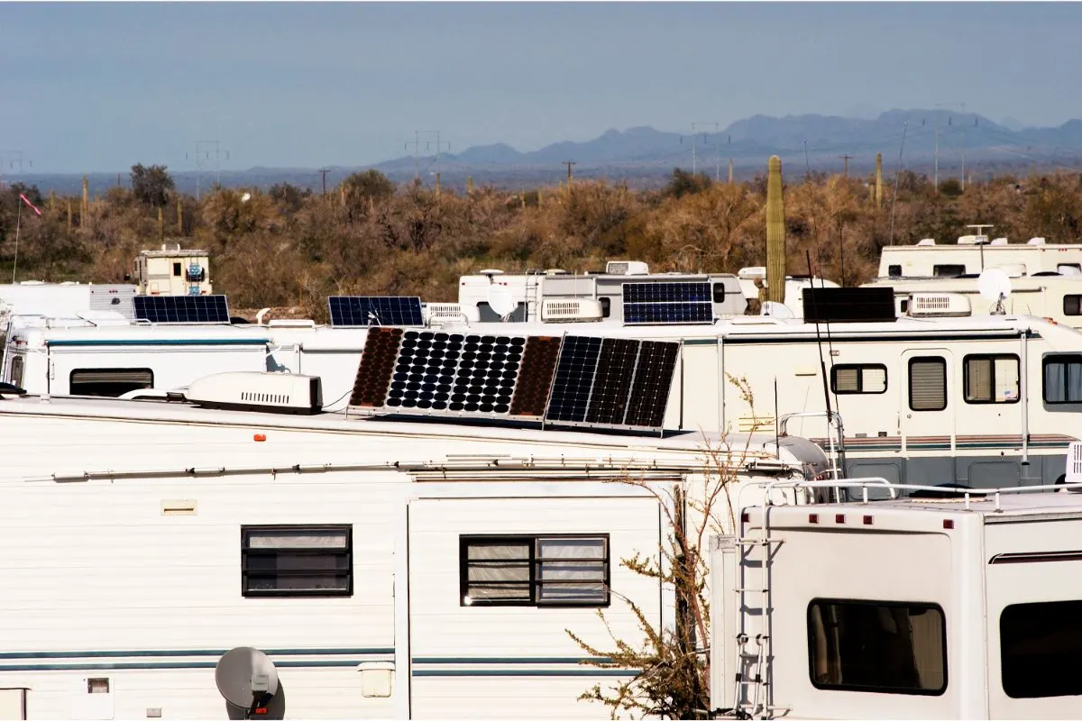 A photo of rv with solar system on top.