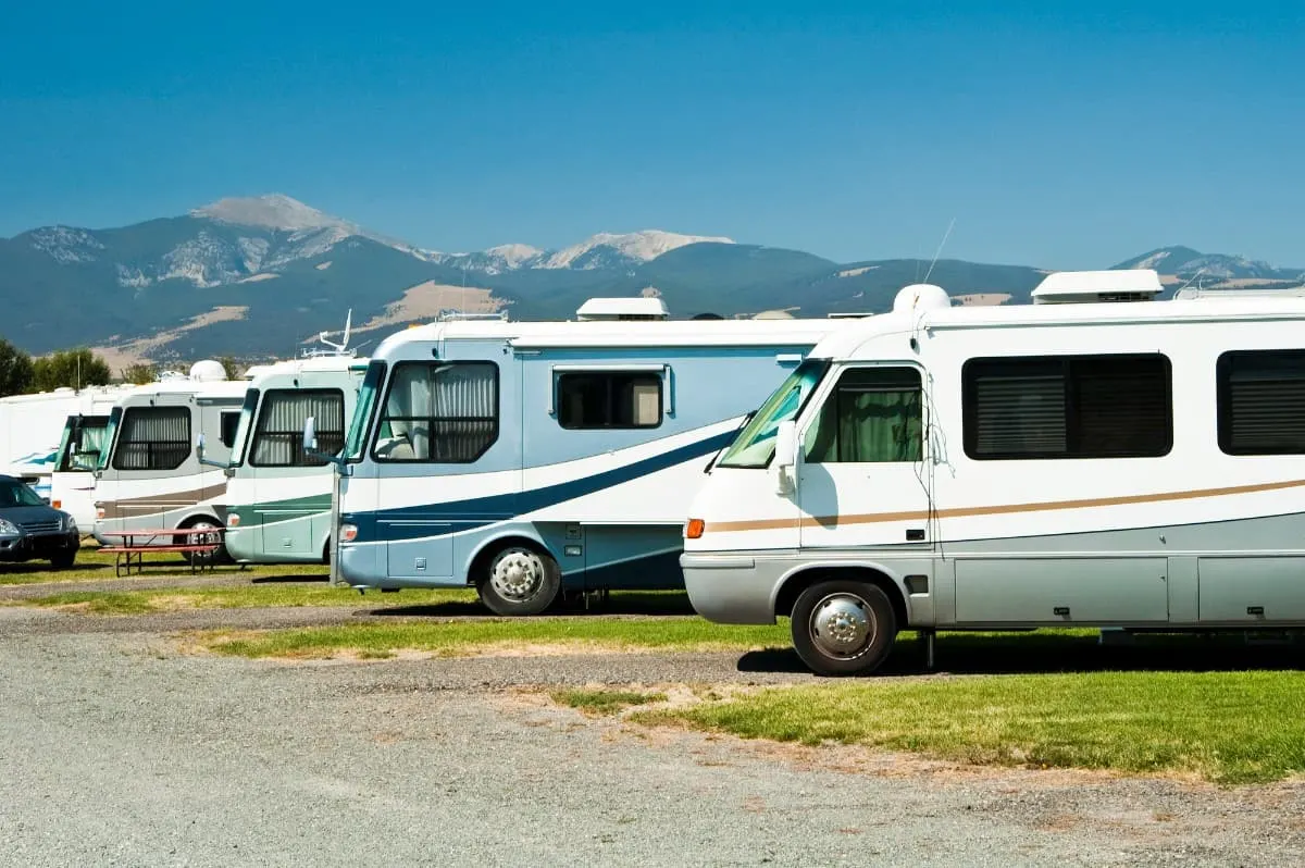 RVs parked in a campground.