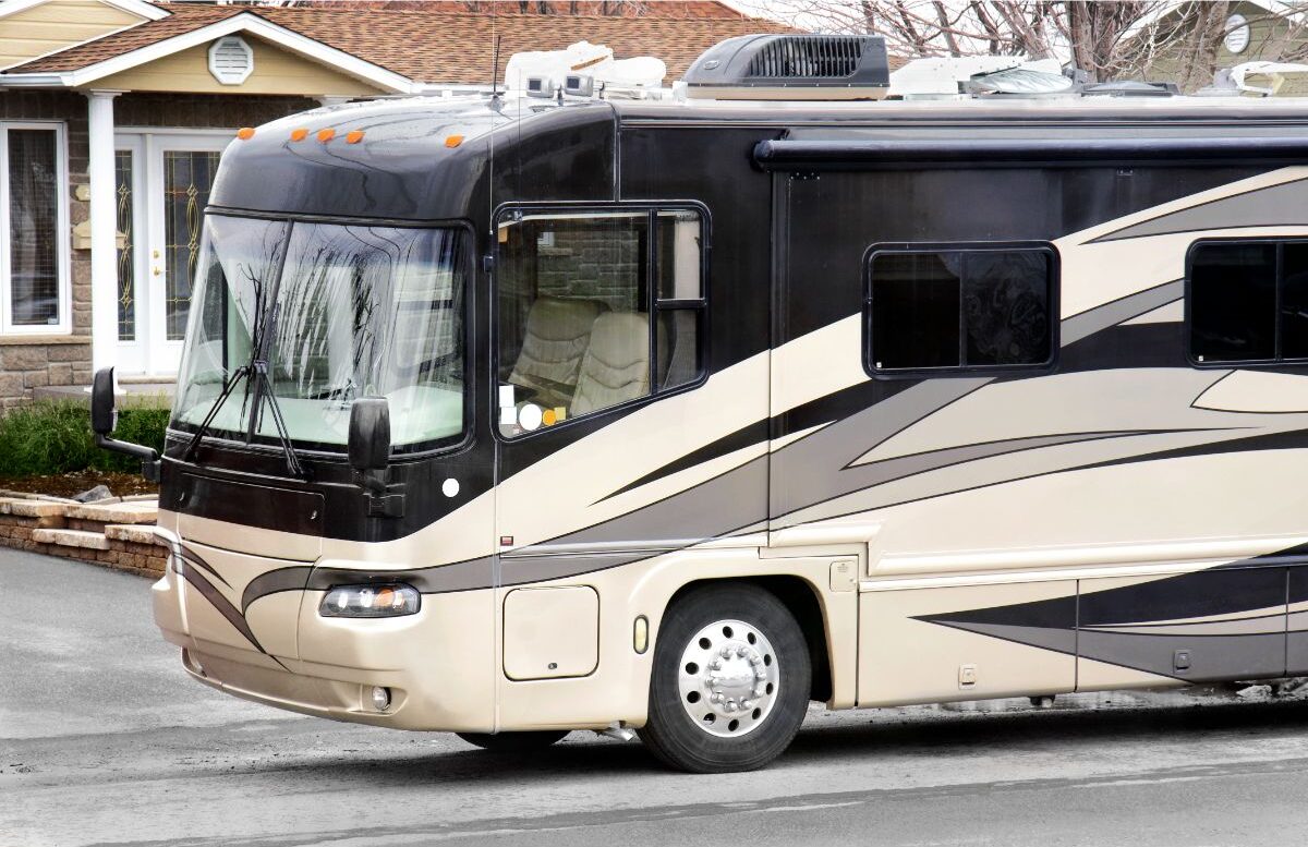 A photo of recreational vehicle in the city street.