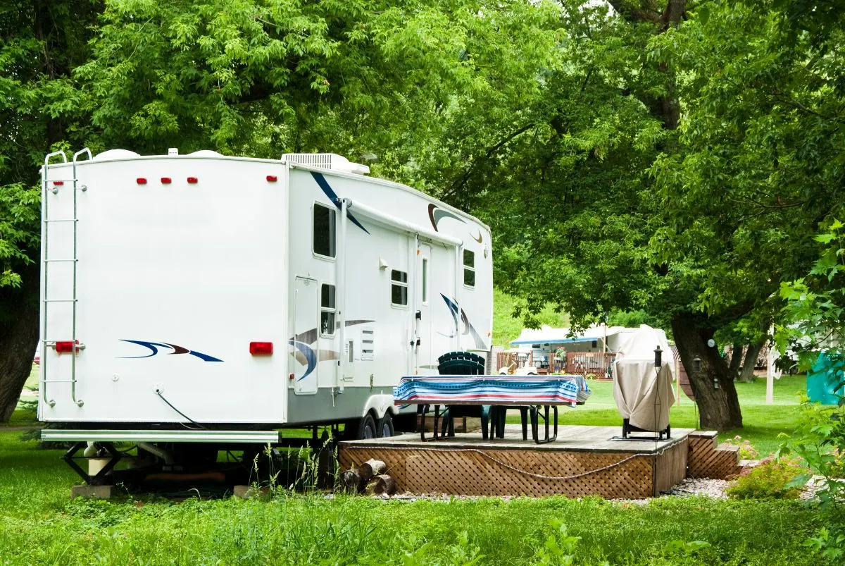 A toy hauler in camping site.