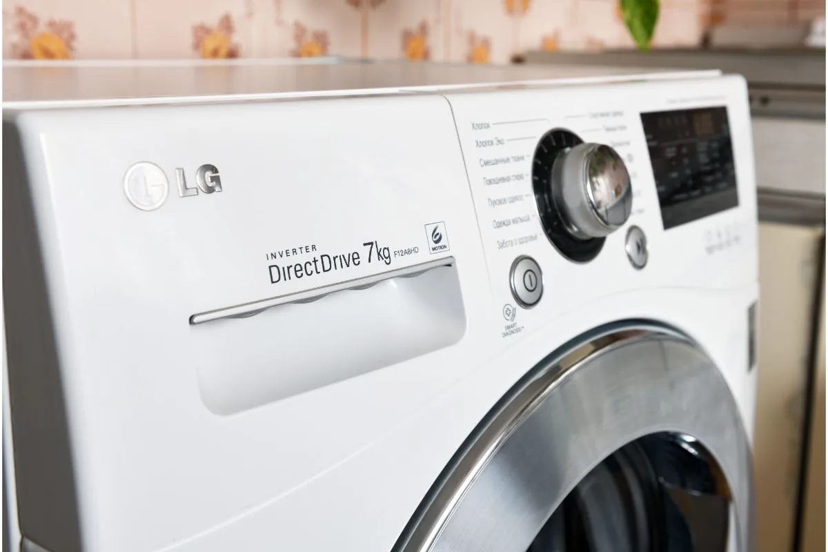 Close up photo of white washer and dryer combo LG brand.