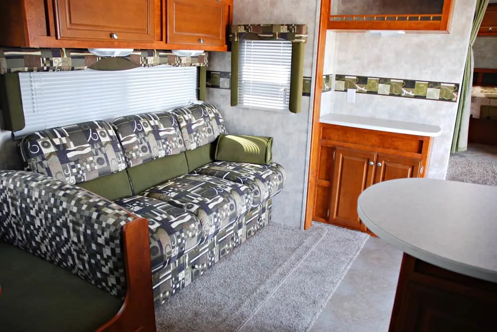 This is a close look at the living room area of the fifth wheel camper interior.