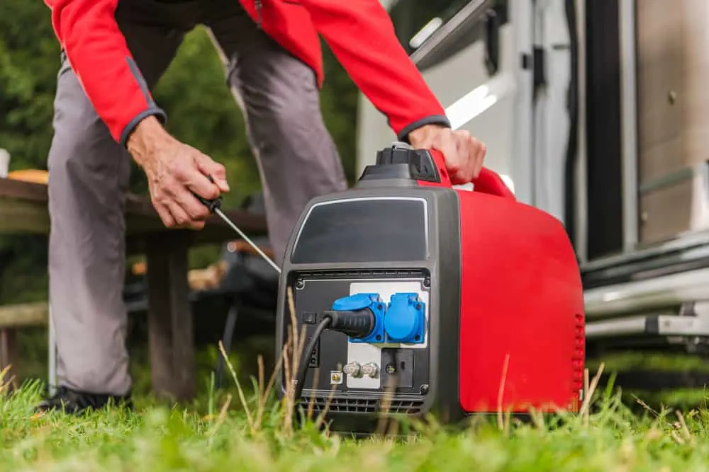 This is a man firing up his gas-powered generator.