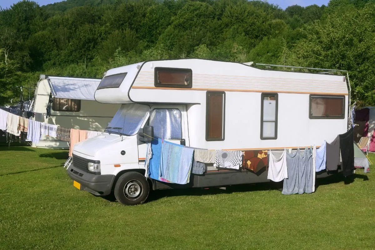 Truck camper on camp site.