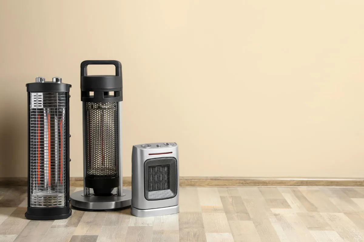 Three different kinds of electric heaters photographed in the floor.