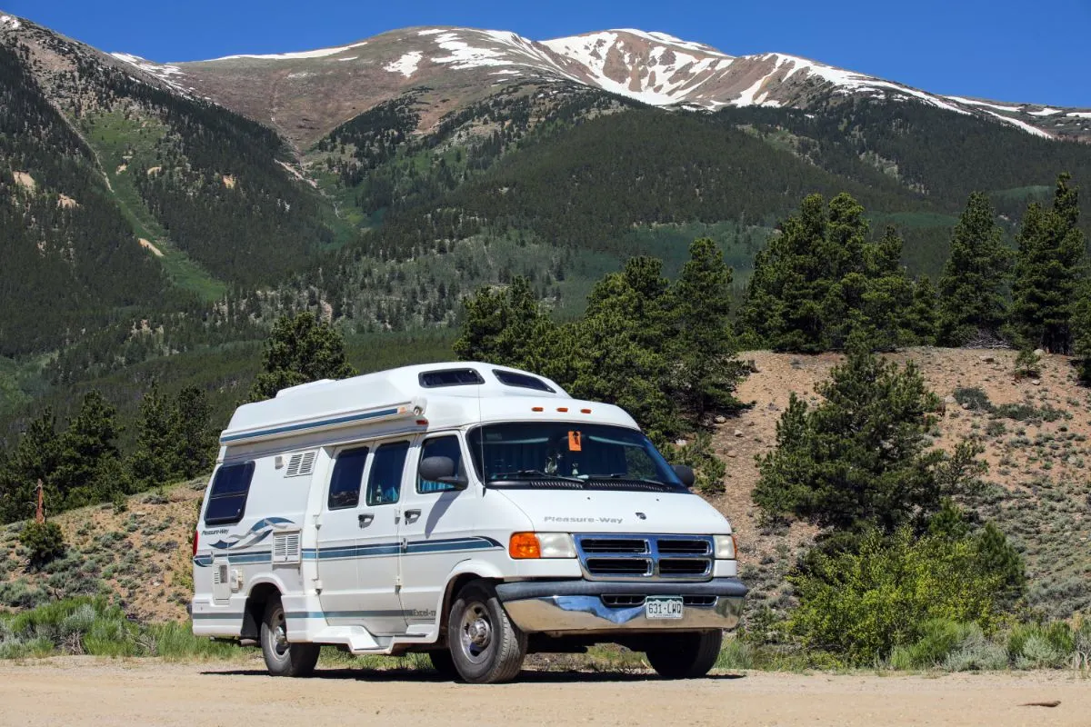 Pleasure-Way Class B RV on road.