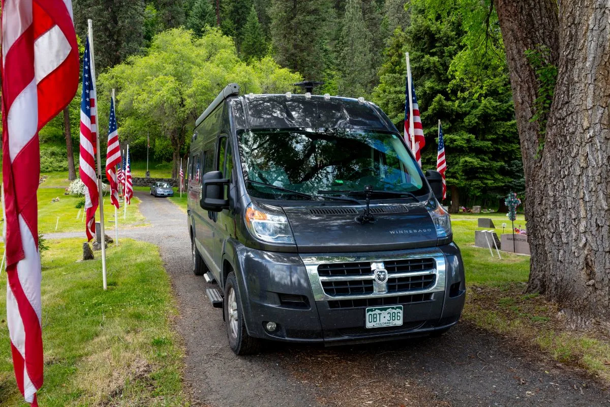 American Coach Class B RV on road.