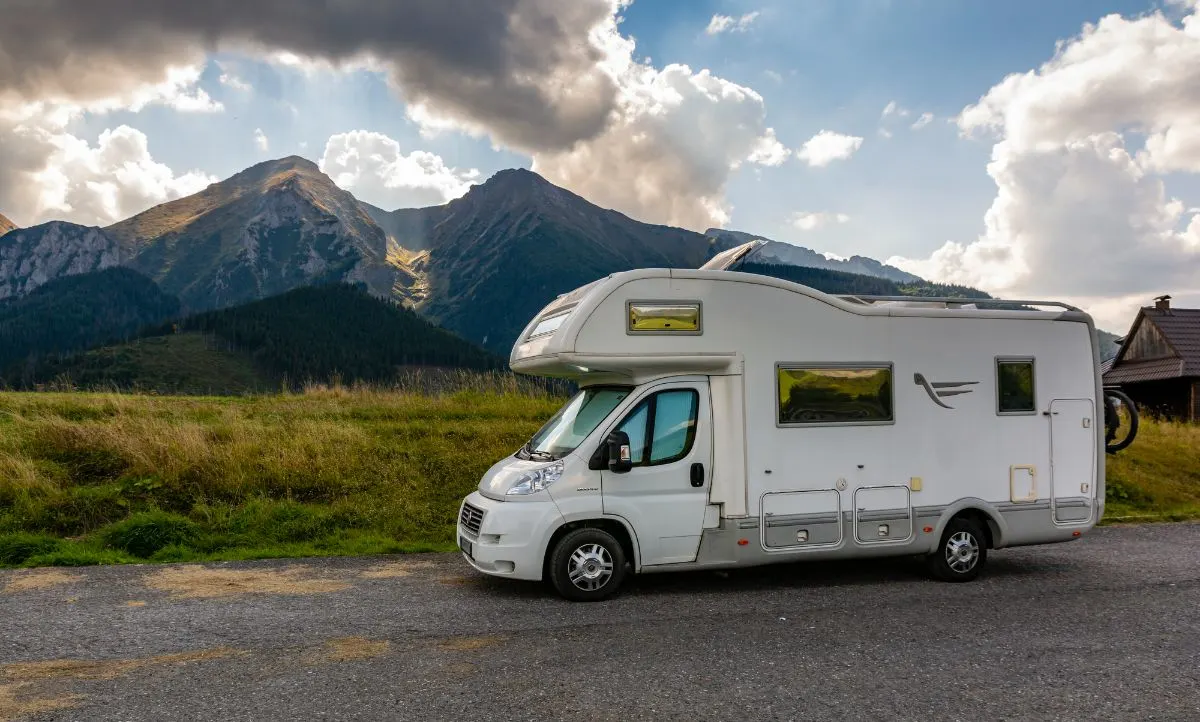 Chinook Summit Class B+ RV on camp site.