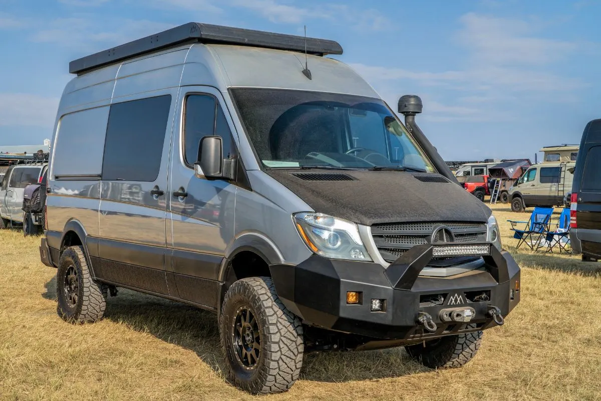 Advanced Class B RV on camp site.