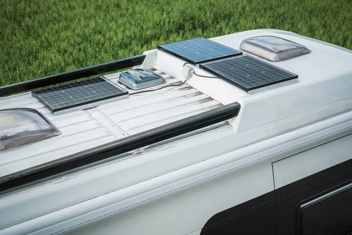 Close up photo of recreational van with fiberglass roofing.