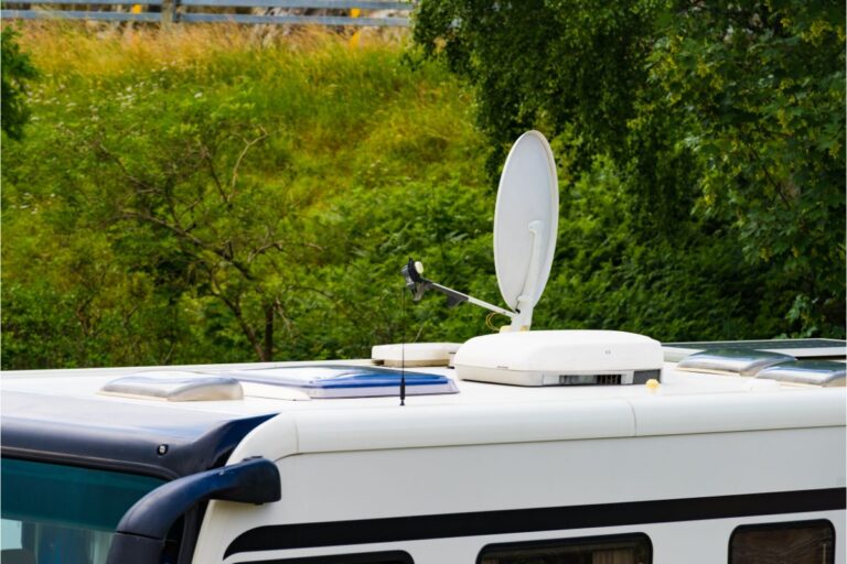 A photo of satellite dish on roof of camper van.