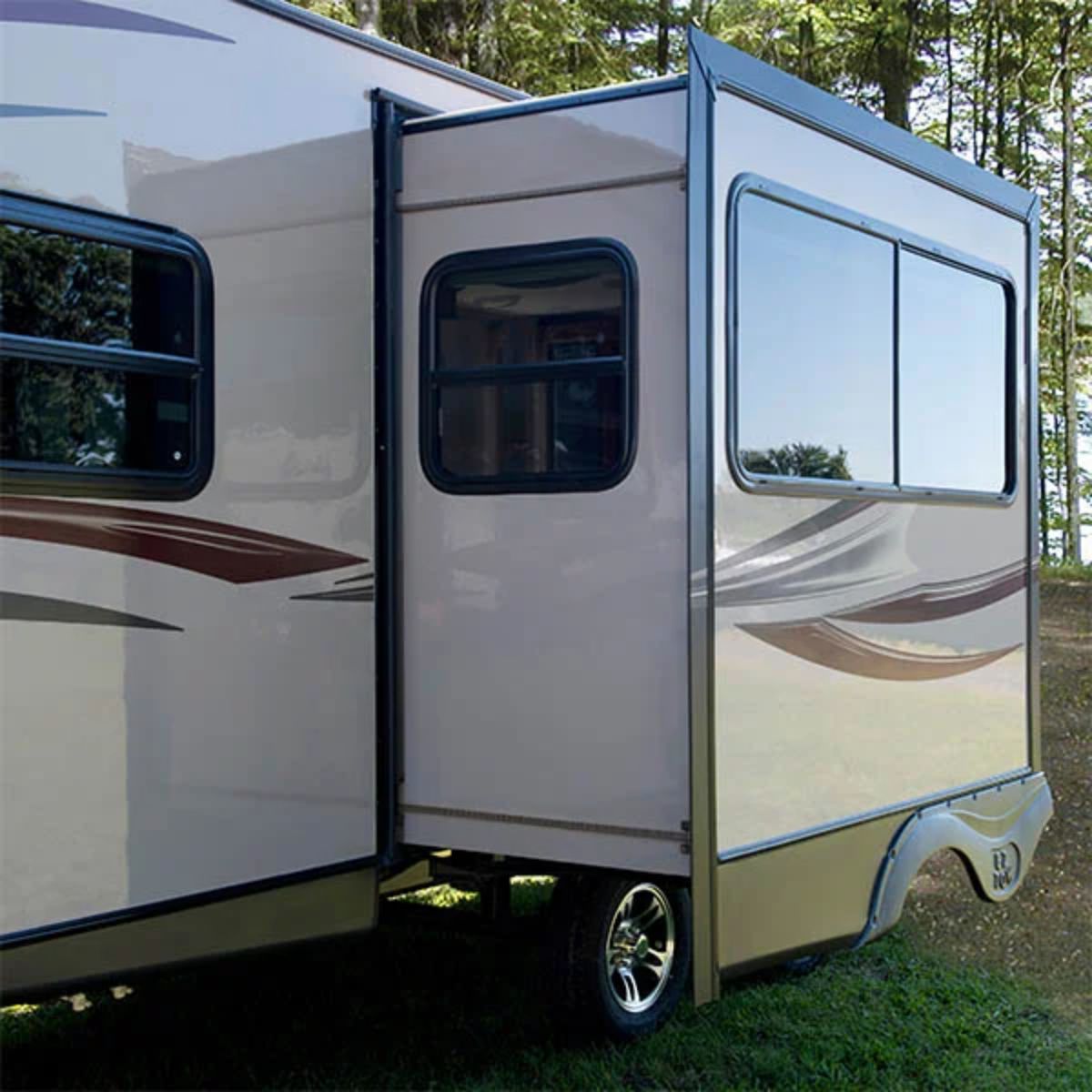 Side view of an RV with slide out extended.