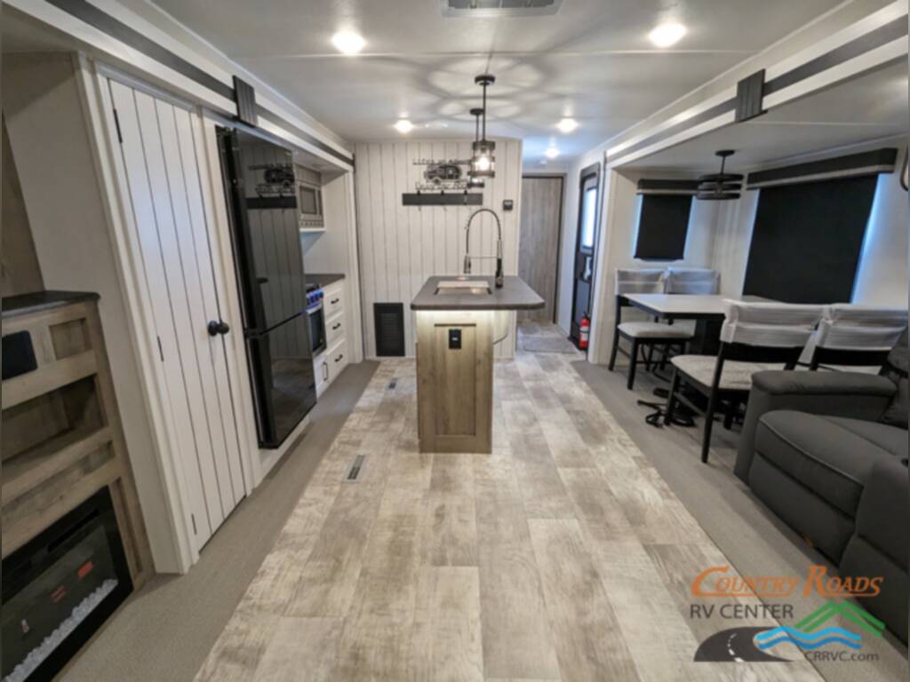 Interior view of the New 2024 Palomino PUMA 31RLQS Travel Trailer RV.