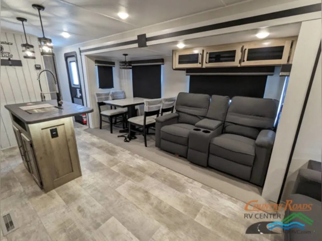 Interior view of the New 2024 Palomino PUMA 31RLQS Travel Trailer RV.