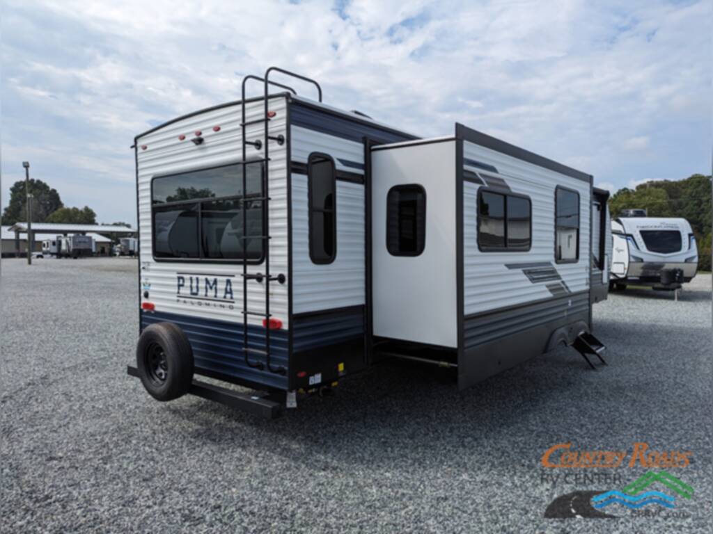 Rear view of the New 2024 Palomino PUMA 31RLQS Travel Trailer RV.