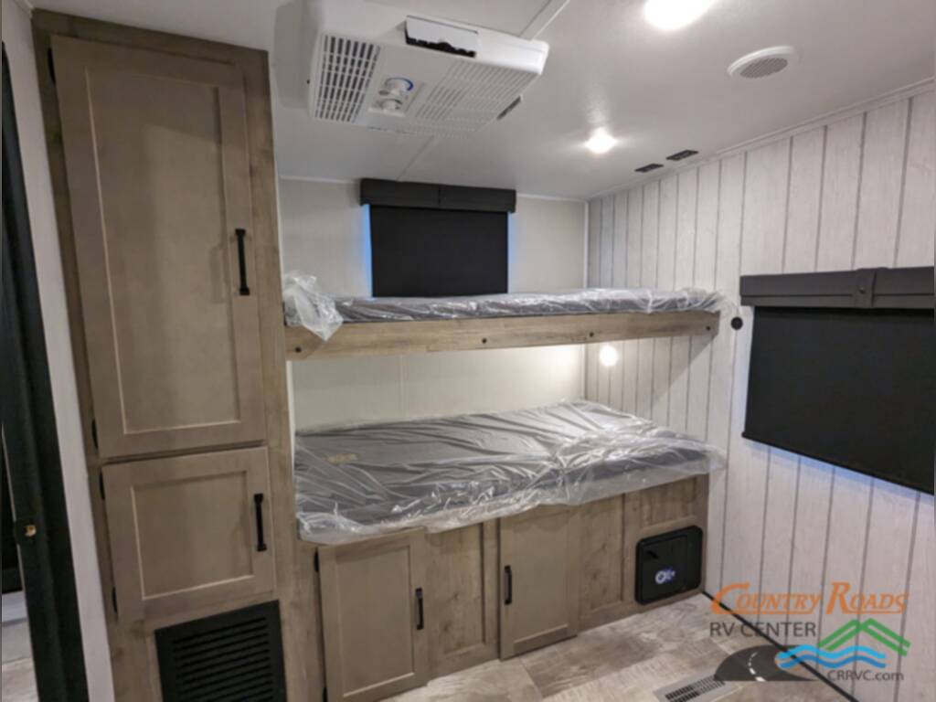 Bed bunks with cabinets.