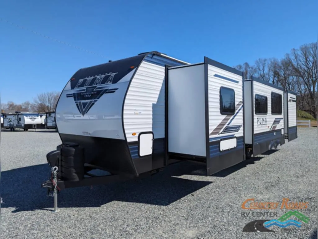 Front view of the New 2024 Palomino Puma 32RBFQ Travel Trailer RV.