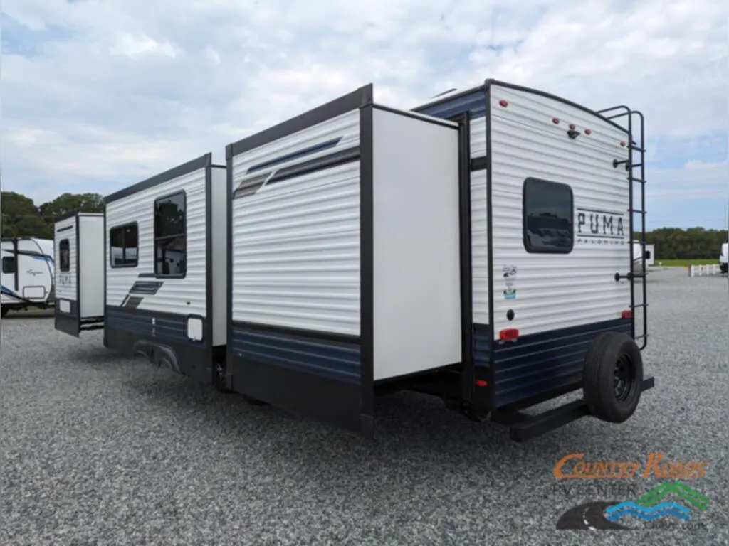 Rear view of the New 2024 Palomino PUMA 32BHFS Travel Trailer RV.