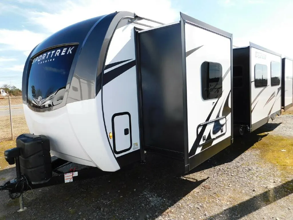 Side view of the New 2023 Venture Rv SportTrek 343VBH Touring Edition Travel Trailer RV.