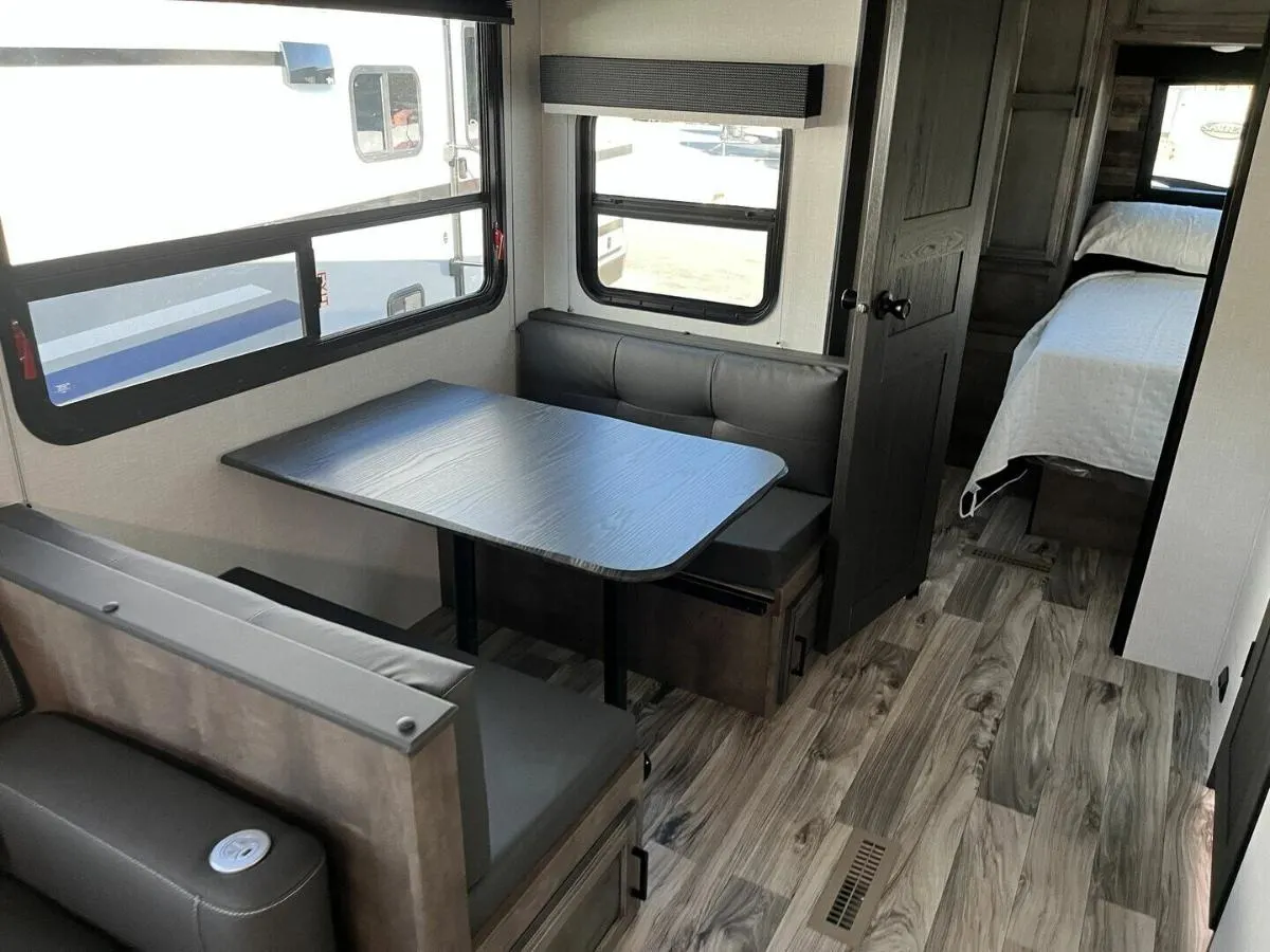 Dinette with pull-out storage drawers.