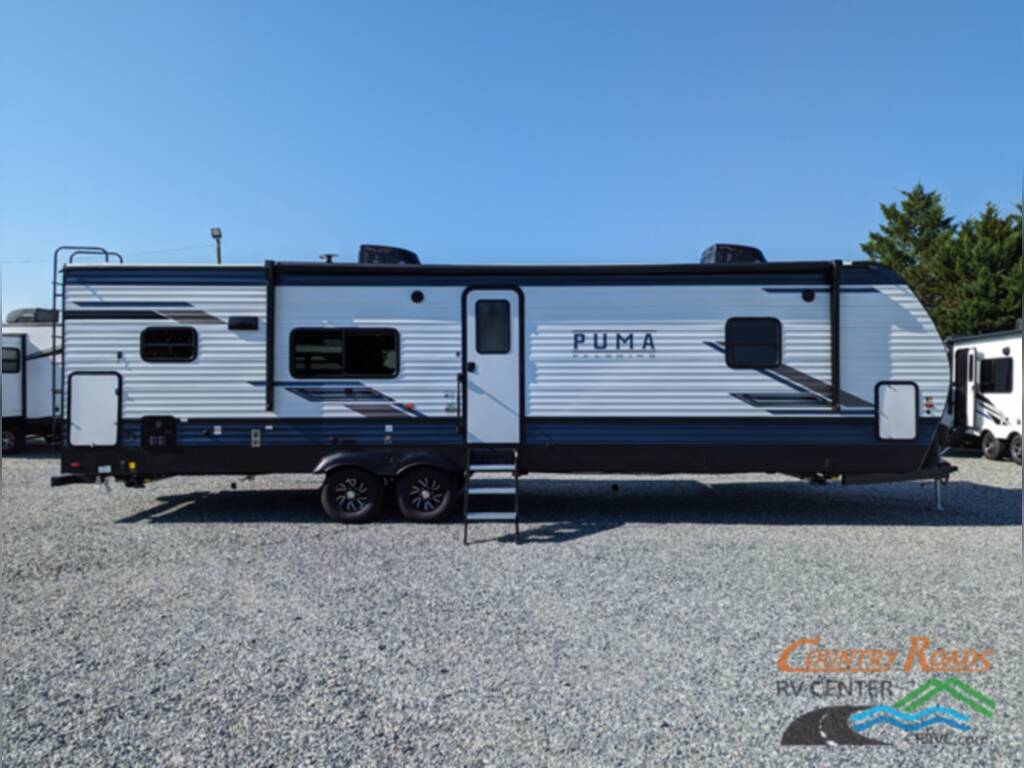 Side view of the New 2024 Palomino PUMA 30RKQS Travel Trailer RV.