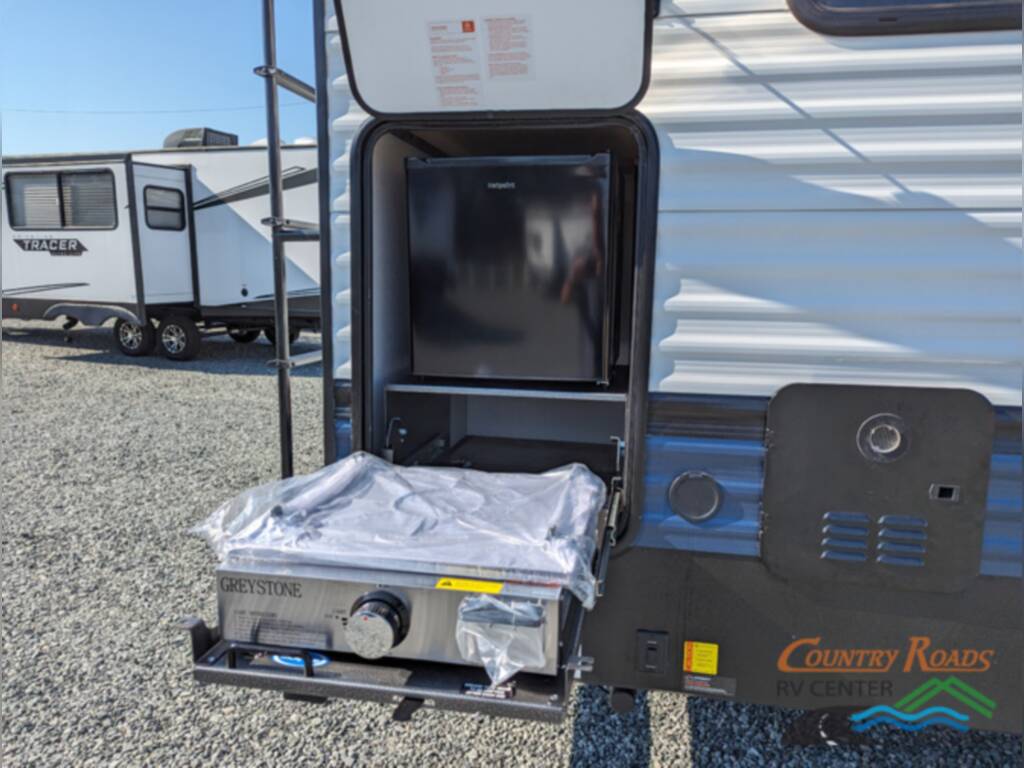 Outside kitchen with a gas burner.