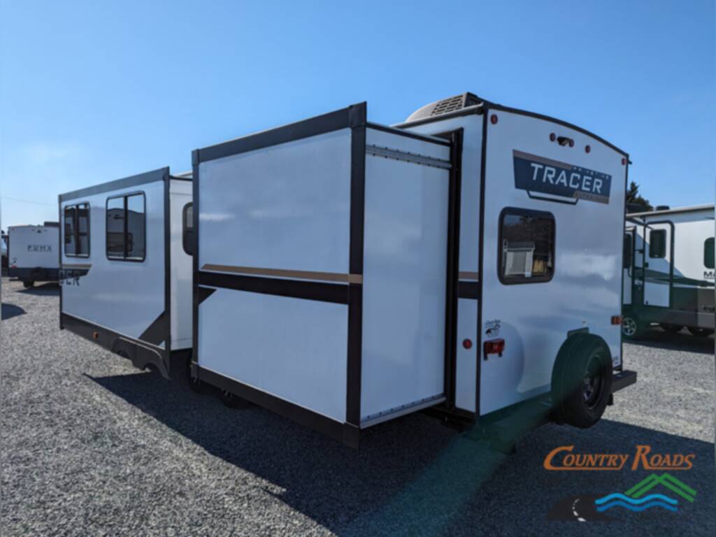 Side view of the New 2024 Prime Time TRACER 31BHD Travel Trailer RV.