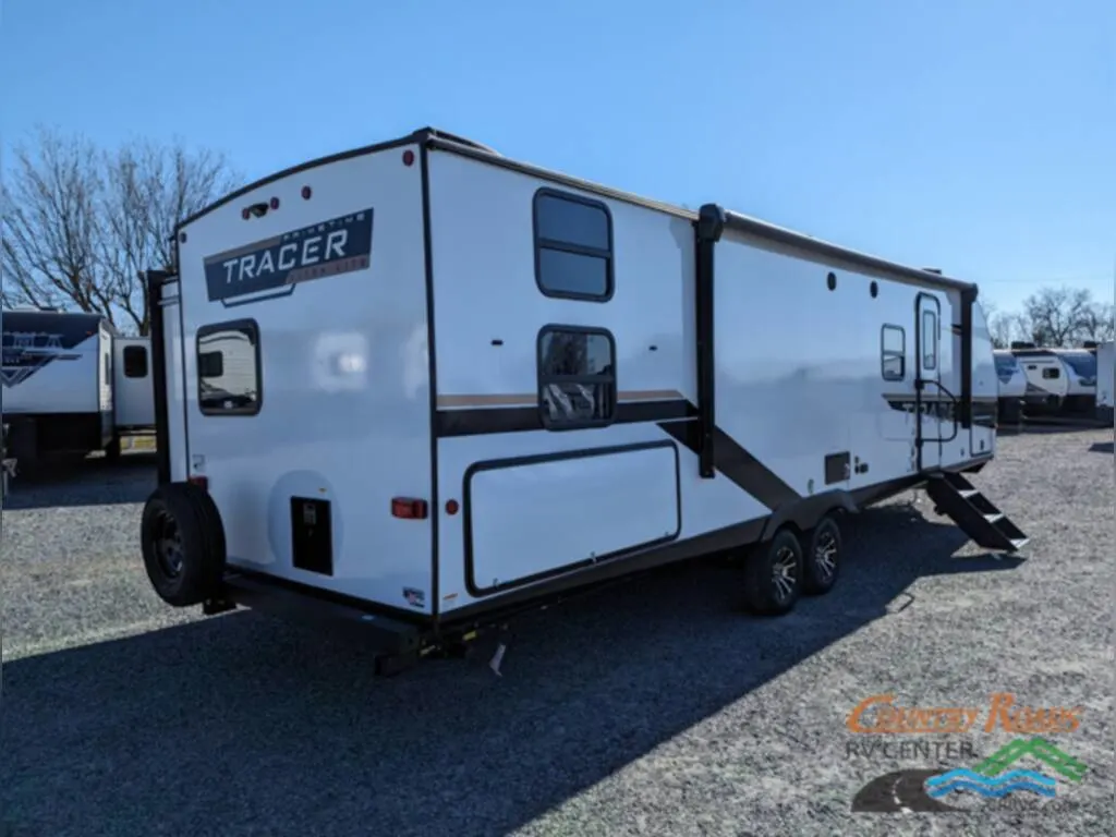 Side view of the New 2024 Prime Time TRACER 31BHD Travel Trailer RV.