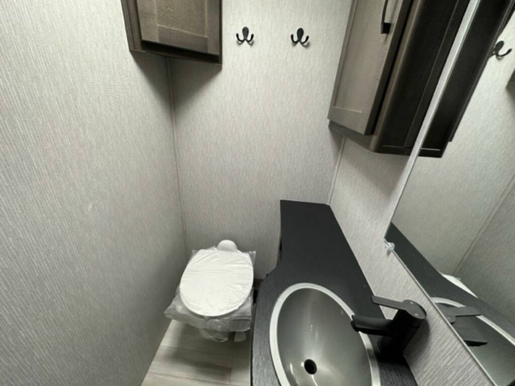 Bathroom with a sink and toilet.