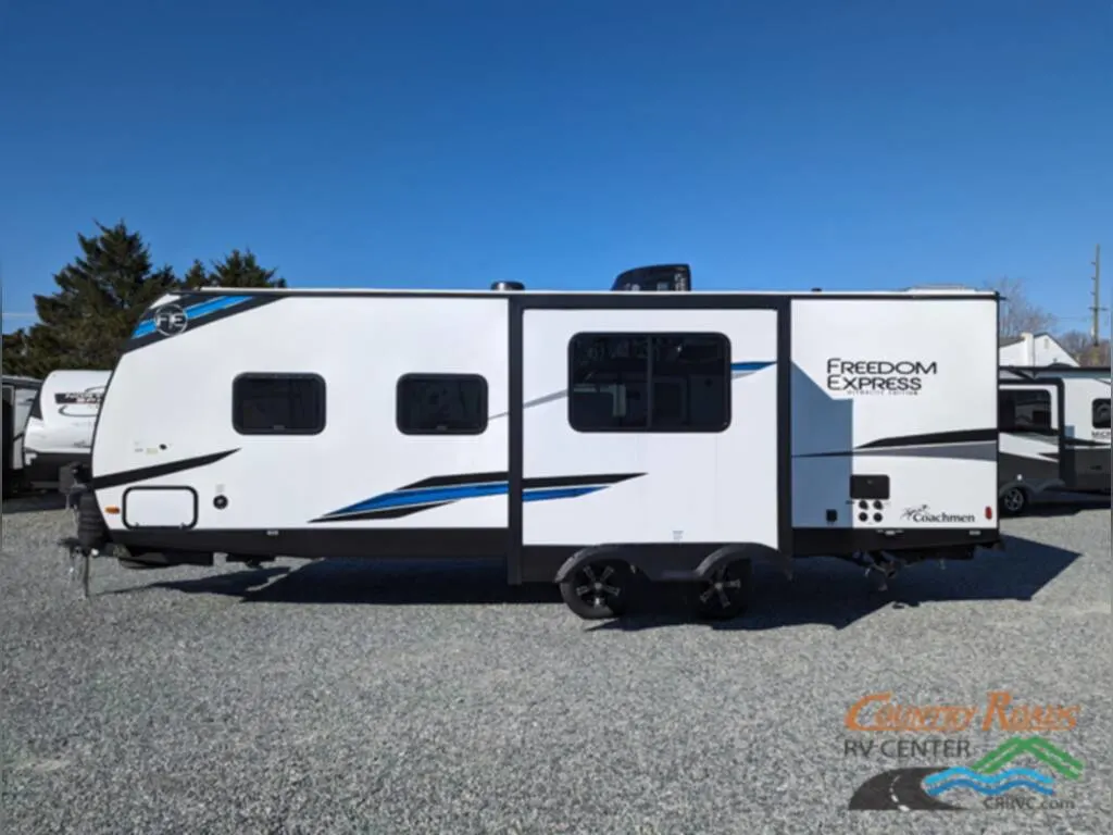 Side view of the New 2024 Coachmen Freedom Express Ultra Lite 252RBS Travel Trailer RV.