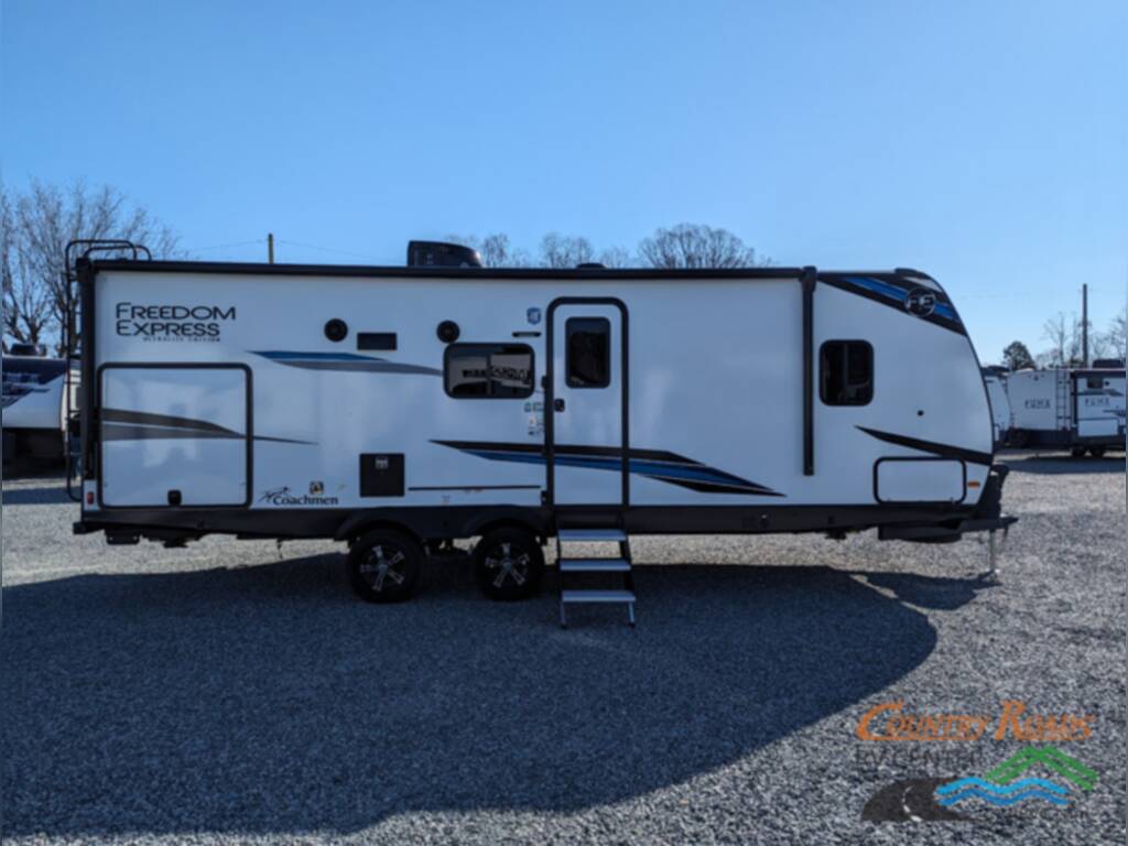 Side view of the New 2024 Coachmen Freedom Express Ultra Lite 252RBS Travel Trailer RV.