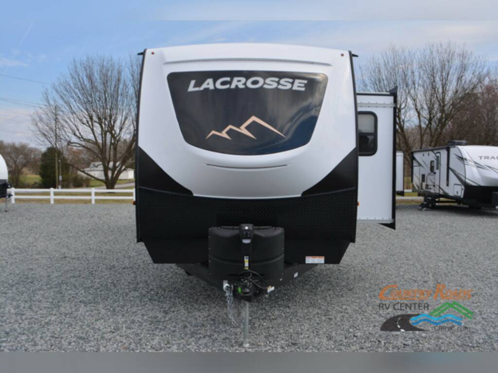 Front view of the New 2023 Prime Time Lacrosse 3411RK Travel Trailer RV.