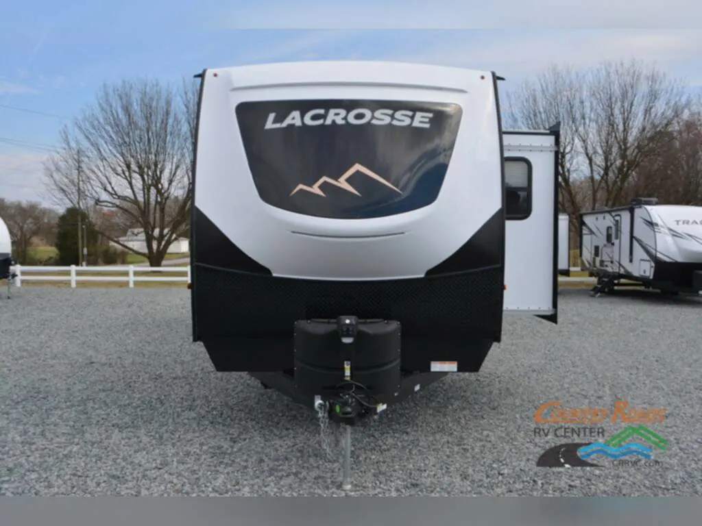 Front view of the New 2023 Prime Time Lacrosse 3411RK Travel Trailer RV.