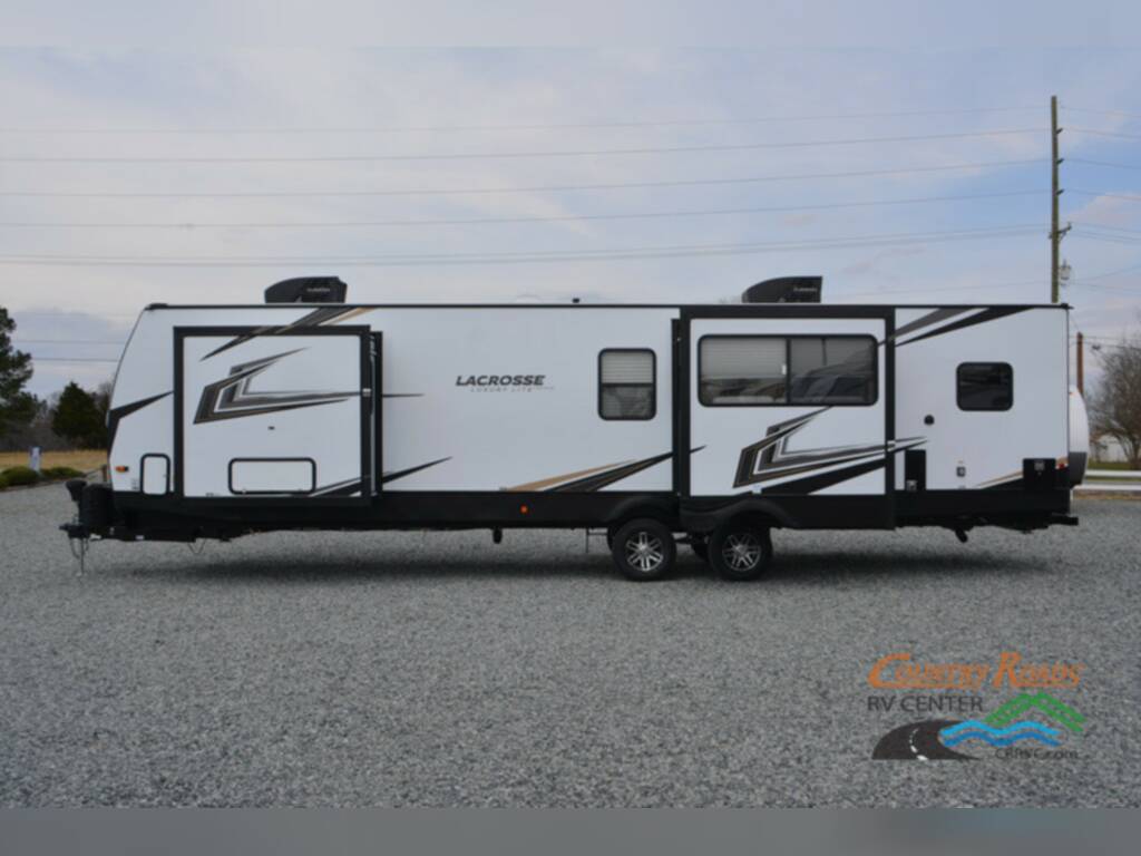 Side view of the New 2023 Prime Time Lacrosse 3411RK Travel Trailer RV.