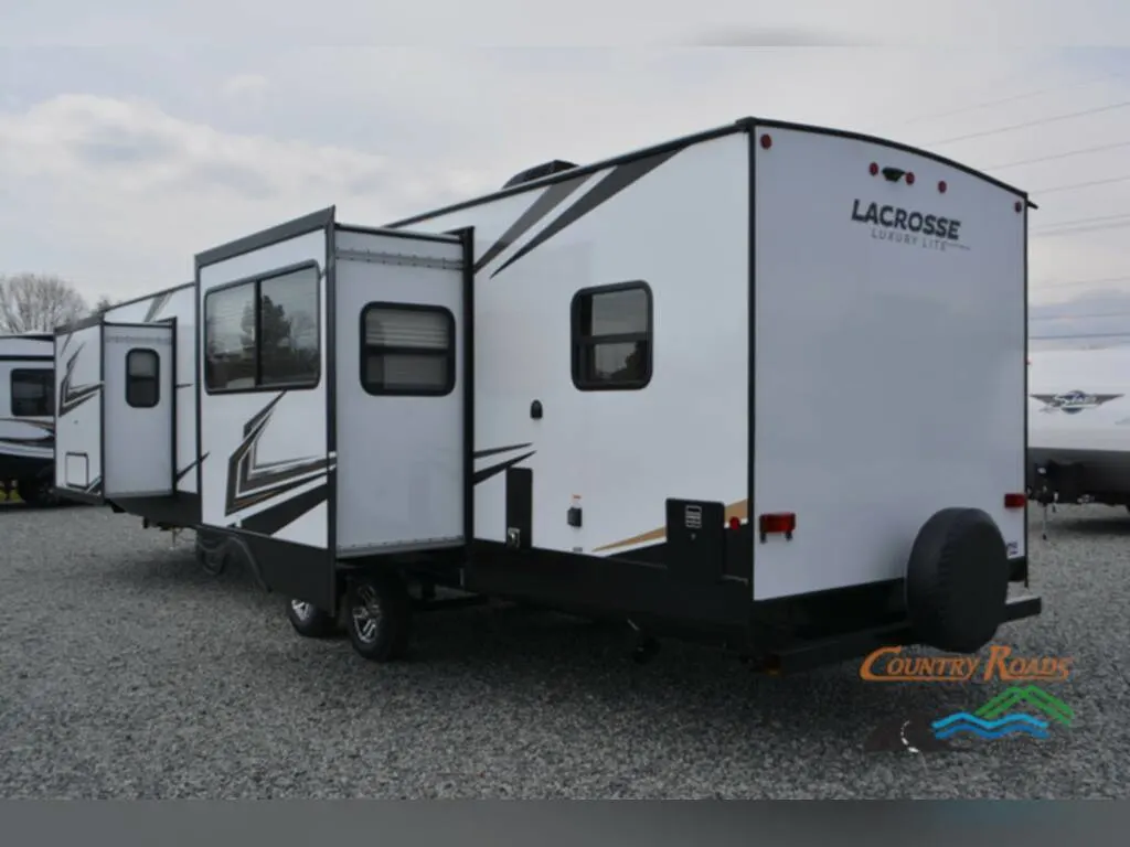 Rear view of the New 2023 Prime Time Lacrosse 3411RK Travel Trailer RV.