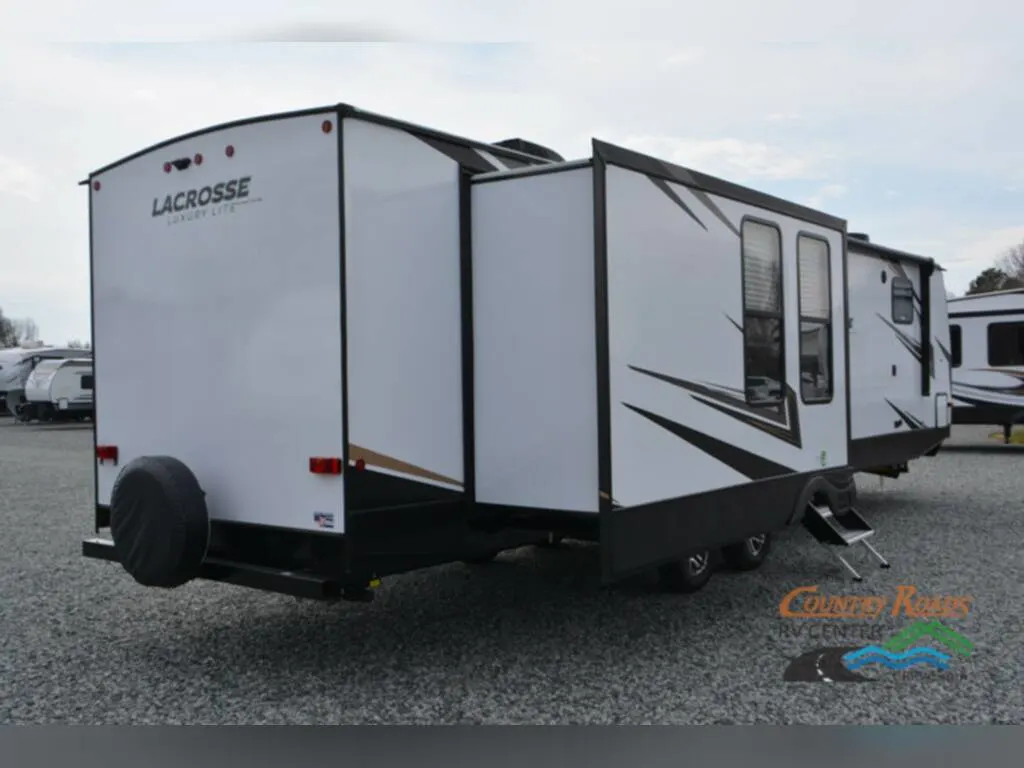 Rear view of the New 2023 Prime Time Lacrosse 3411RK Travel Trailer RV.