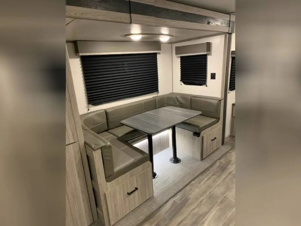 Dinette with drawers underneath the chairs.