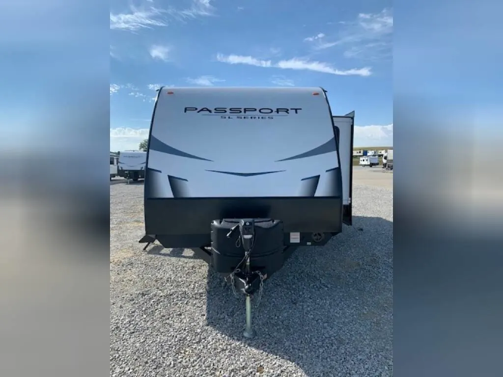 Front view of the New 2023 Keystone Rv Passport SL 221BH Travel Trailer RV.