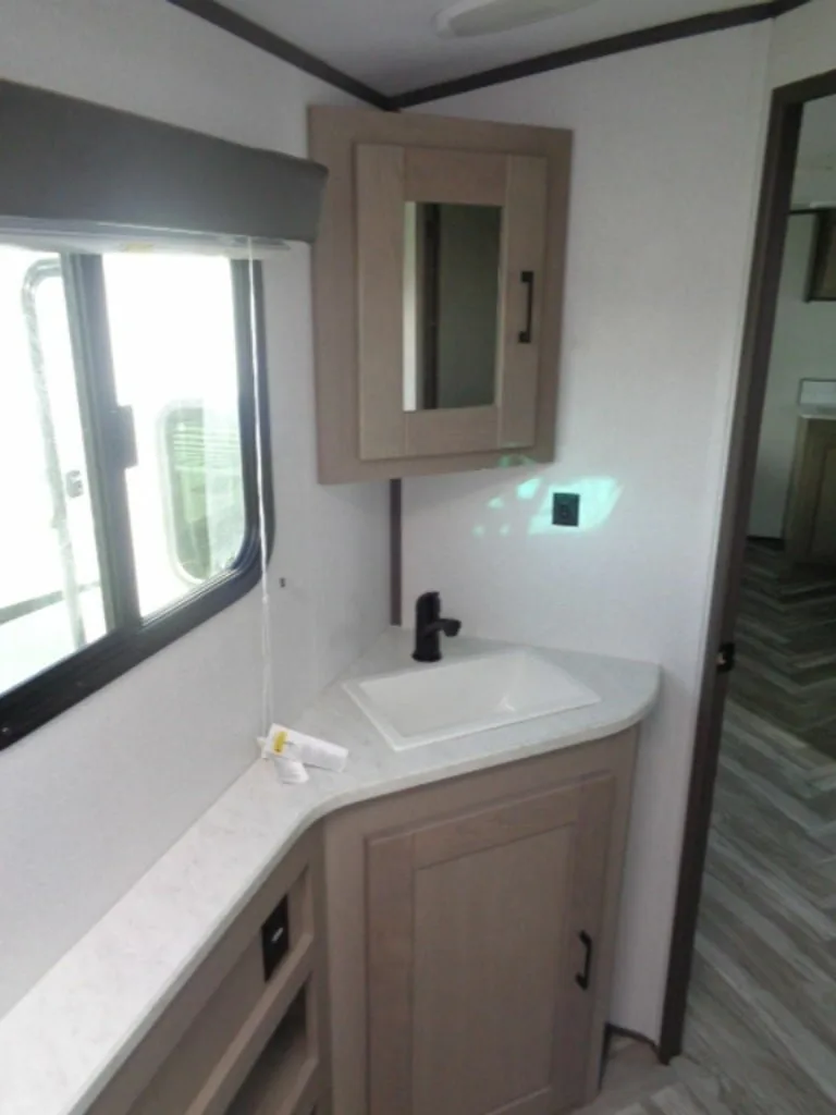 Bathroom with a sink and a medicine cabinet.