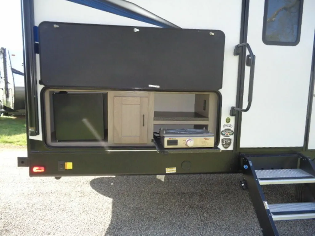 Outdoor kitchen with a gas burner.