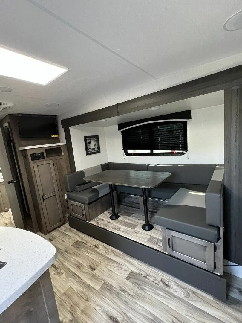 Dinette with pull-out storage drawers.