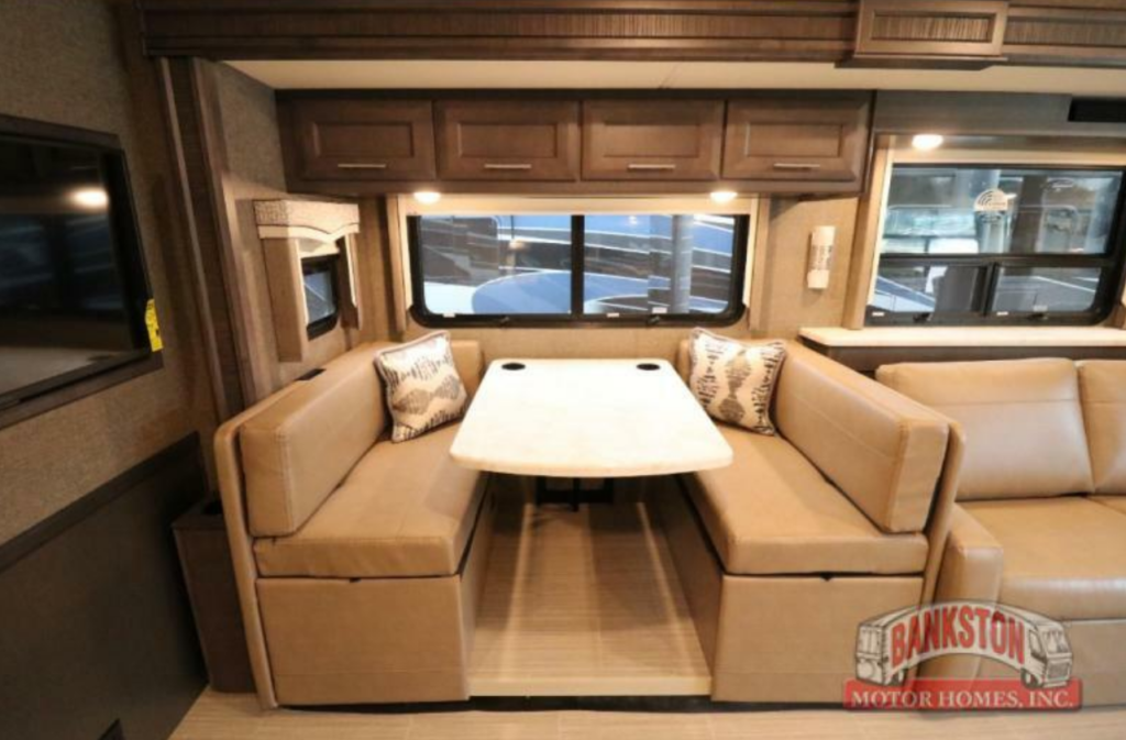 Dinette with overhead cabinets.