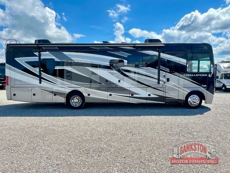 Side view of the New 2022 Thor Motor Coach Challenger 35MQ Class A RV.