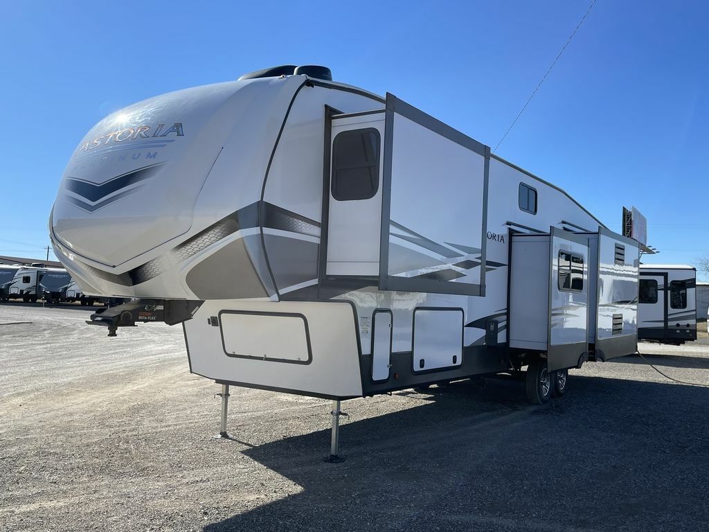 Side view of the New 2022 Dutchmen Astoria Platinum 3553MBP Fifth Wheel RV.